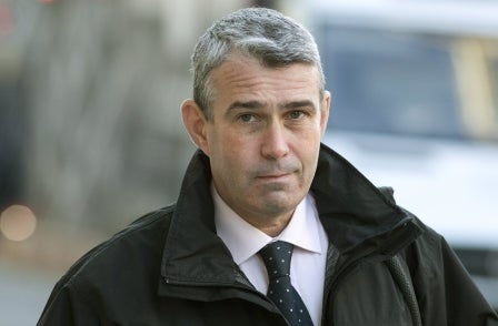 Hacking trial: News International security chief 'dug a hole in his garden and burnt stuff'